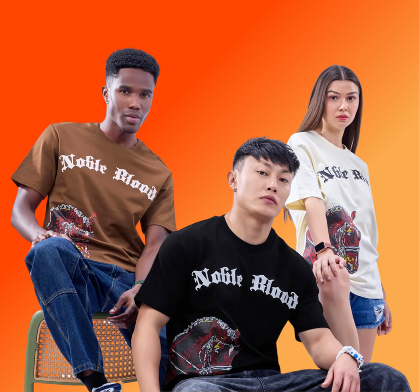 Three people wearing 'Noble Blood' printed t-shirts against an orange background